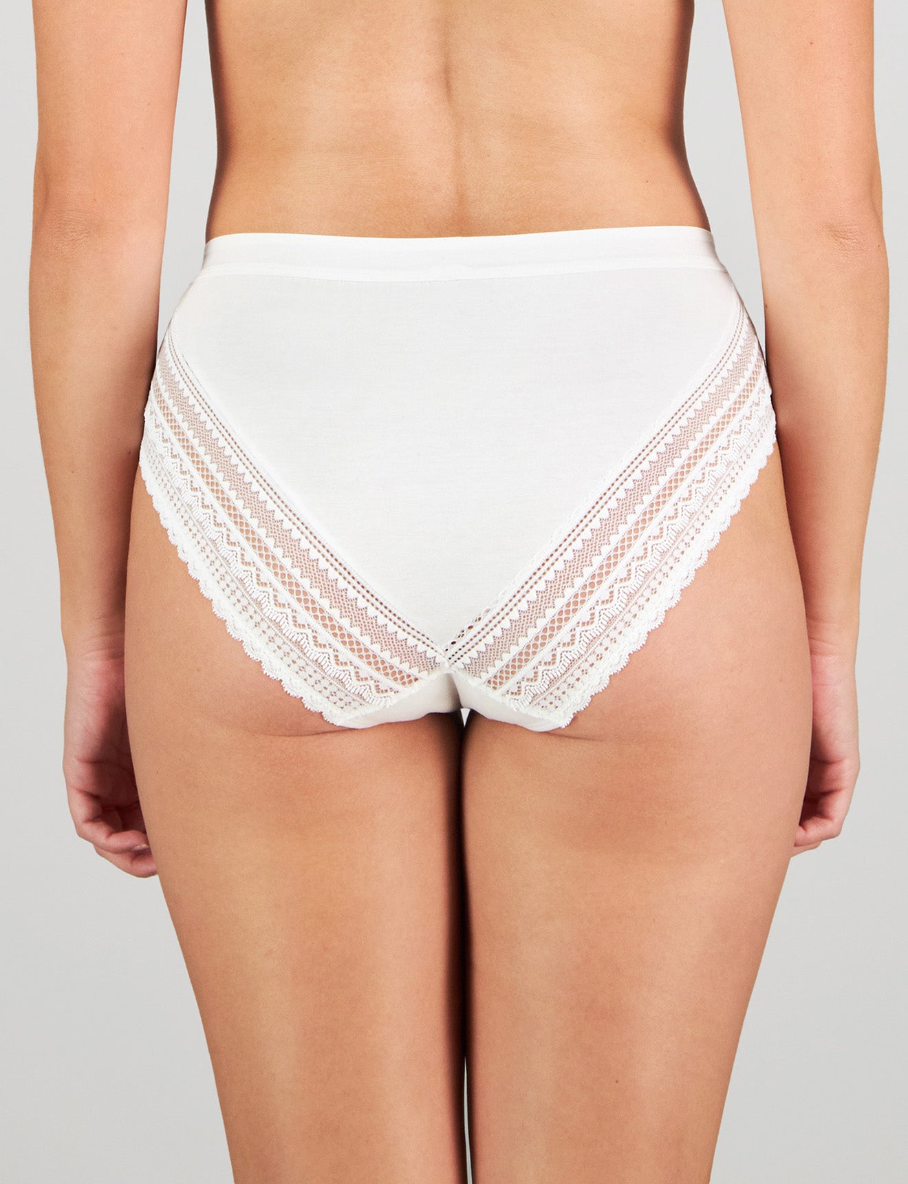 Model wears Angelica Midi in WHITE. On body back view
