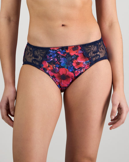Model wears Wild Violet Full Brief in JAZZY FLORAL PRINT. On body front view