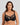 Model wears Mesmerise Underwire Bra in BLACK. On body front view