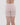 Model wears Smoothing Bodywear Chafer Short in CARAMEL. On body back view