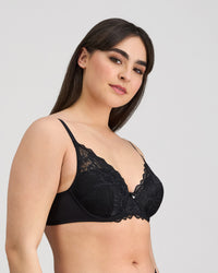 Model wears Embrace Contour Bra in BLACK. On body side view