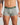 Model wears Retros Print Mens Trunk in ART DECO TILE PRINT. On body front view