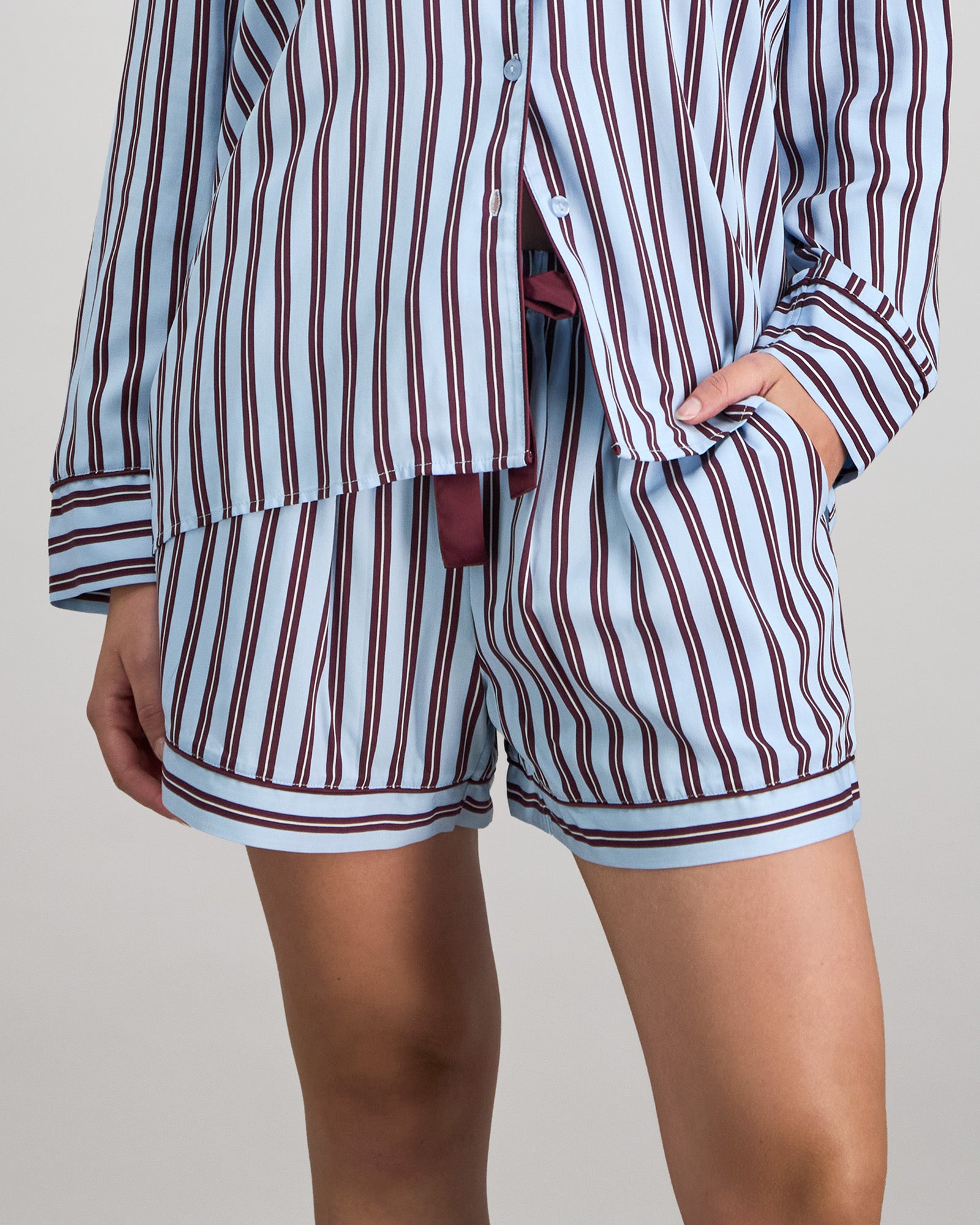 Model wears Cabana Stripe Short Pj in COOL BLUE. On body front view