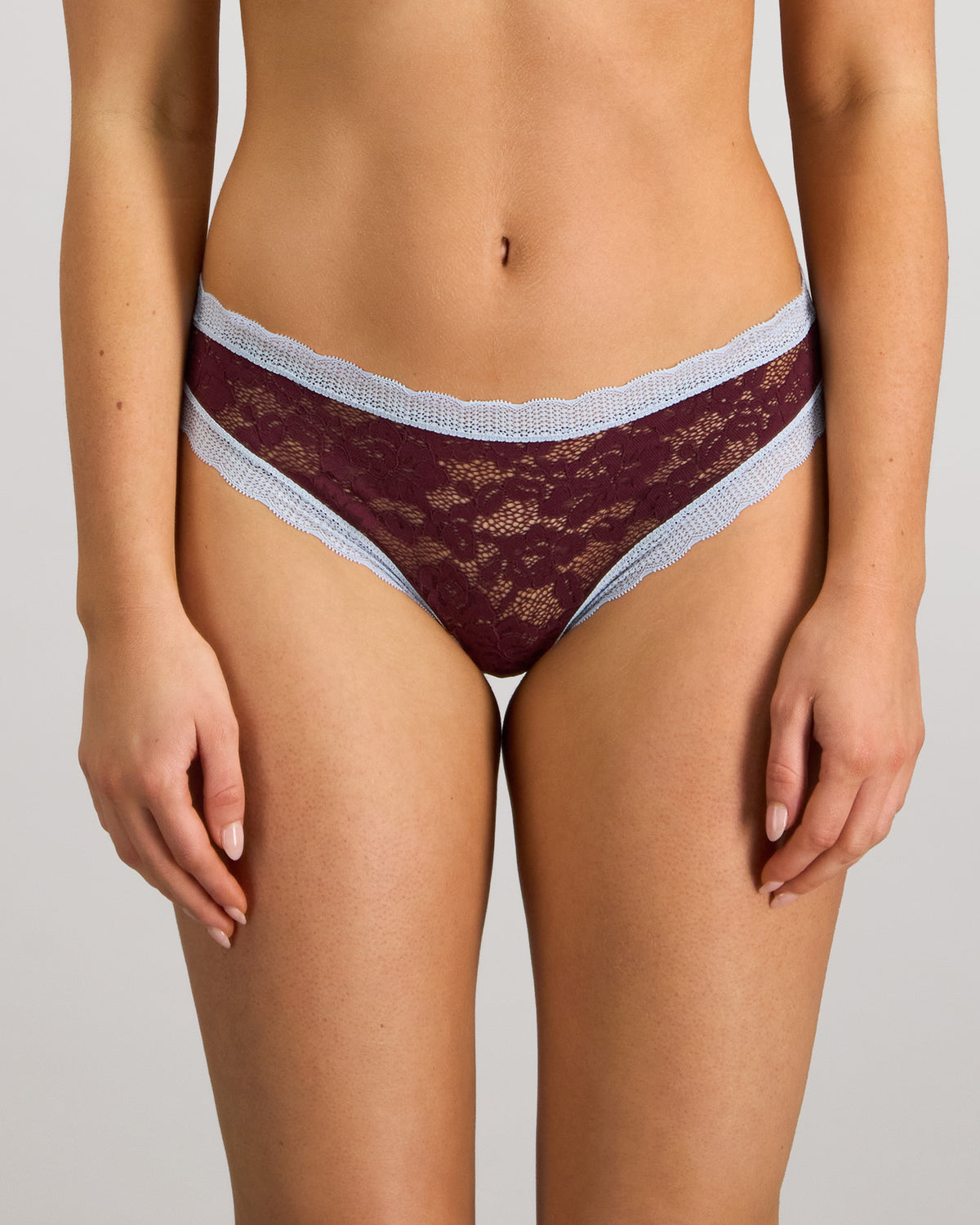 Model wears Leo Bikini in FIG/SKYWAY. On body front view
