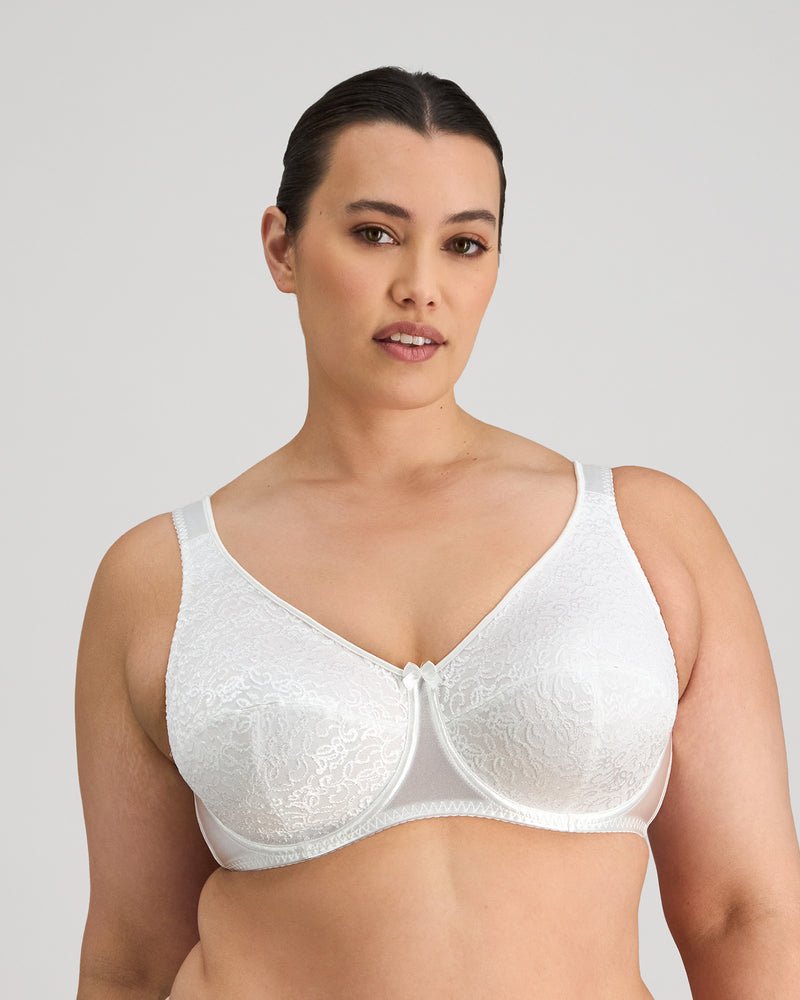 Model wears Charlotte Underwire Bra in WHITE. On body front view