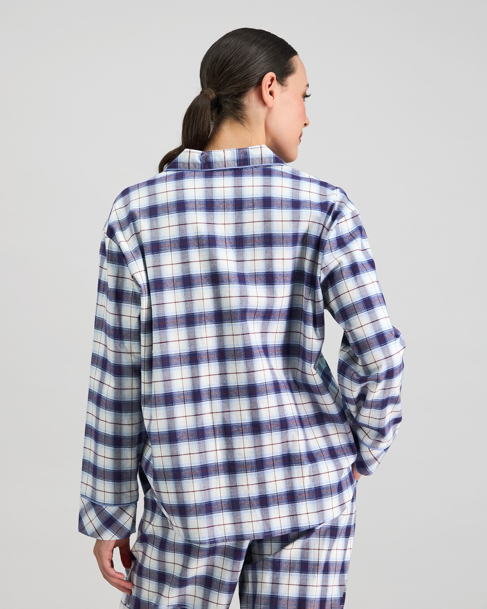 Model wears Cosy Flannel Long Sleeve Pj Top in NAVY BLAZER. On body back view