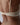 Model wears Geometric Lace Contour Bra in TOASTED ALMOND/PRISTINE. On body back view