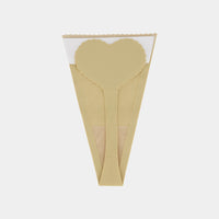 Model wears Stick On Thong 2Pk in Nude. On body back view