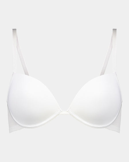 Model wears Body Basics Contour Bra in WHITE. On body front view