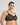 Model wears Delicate Lace Underwire Bra in BLACK/CREAM TAN. On body side view
