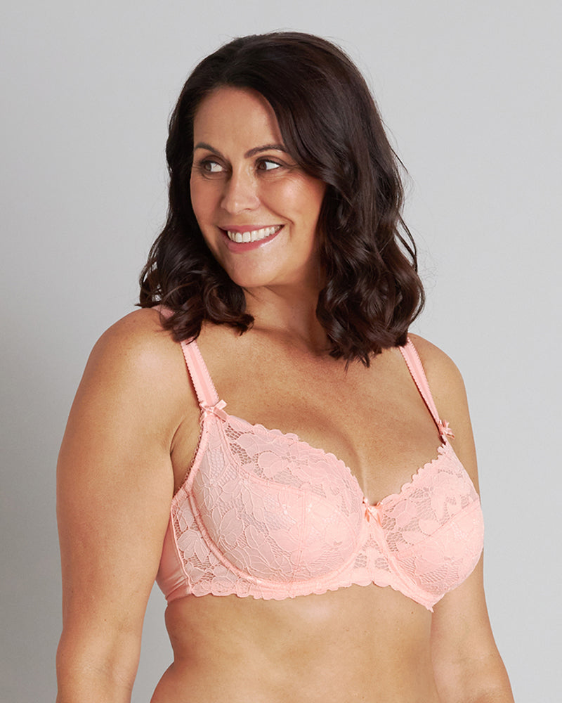 Model wears Alice Underwire Bra in PEACH BUD. On body side view