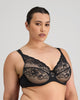 Model wears Intrigue Contour Bra in BLACK. On body front view