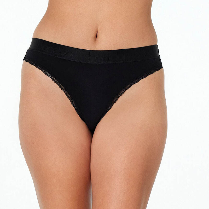 Model wears Cotton Logo Thong in BLACK. On body front view