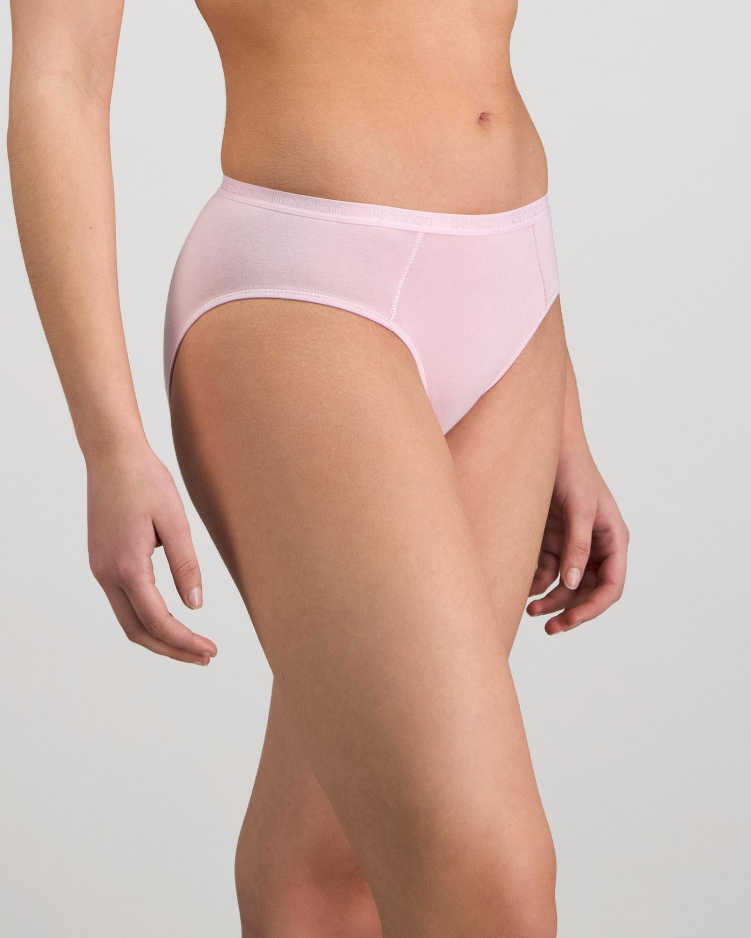 Model wears Body Cotton Bikini in FESTIVAL BLOOM. On body side view