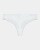 Model wears Cotton Logo Thong in WHITE. On body front view