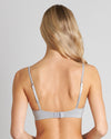 Model wears Simply Seamless Contour Bra in LIGHT GREY MARLE. On body back view
