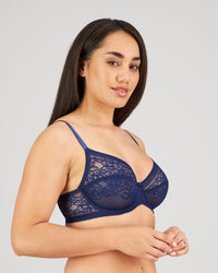 Model wears Eternal Underwire Bra in Medieval Blue. On body side view