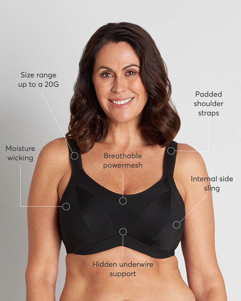Model wears Power Underwire Bra in BLACK. On body front view