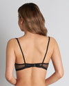 Model wears Delightfully So Bralette in BLACK. On body back view