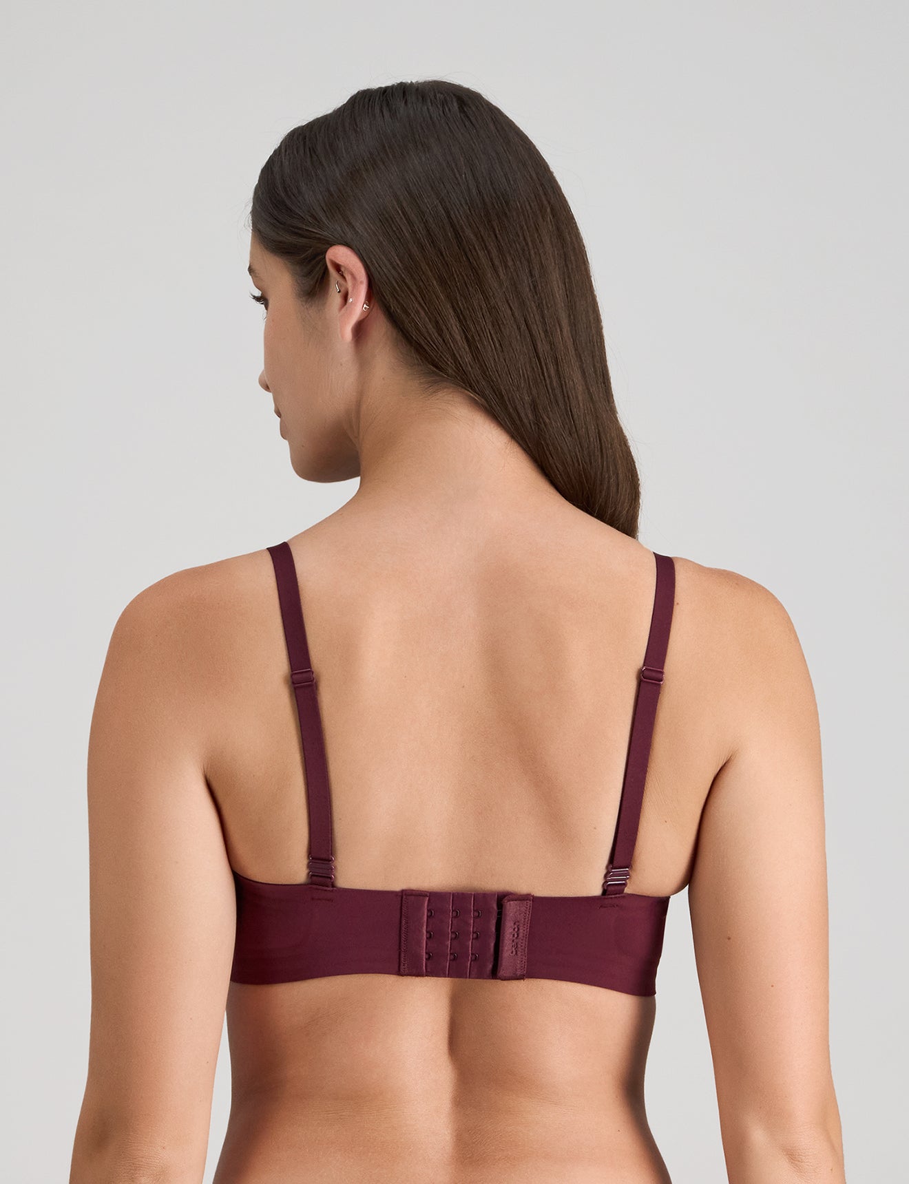 Model wears Comfit Collection Wire Free Bra in FIG. On body back view