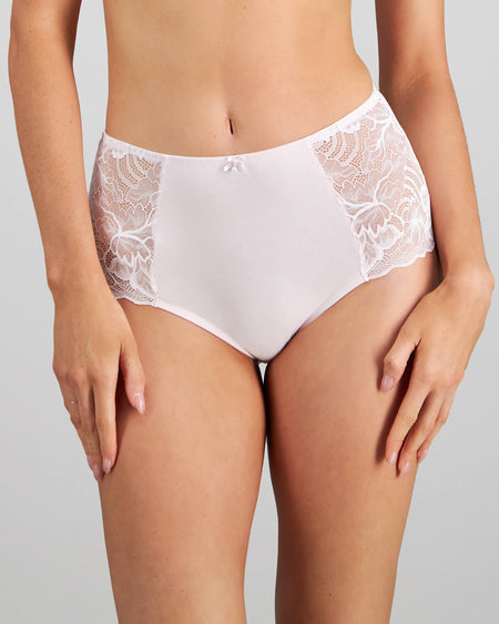 Model wears Embrace Full Brief in FESTIVAL BLOOM. On body front view