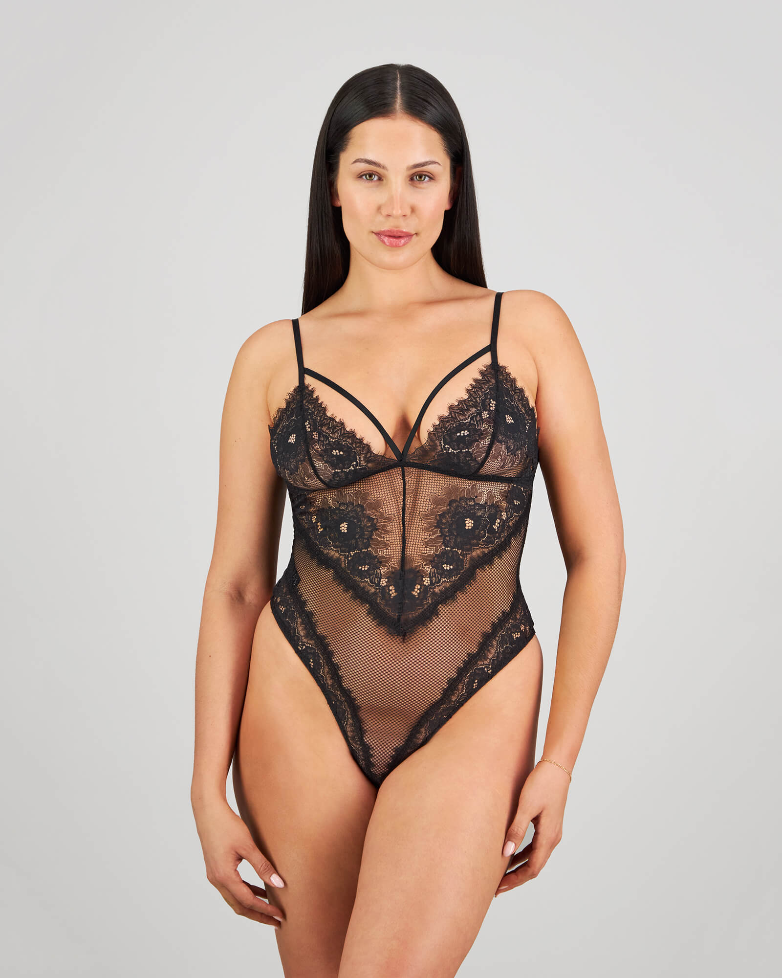 Layla Bodysuit in BLACK. Flat lay back view
