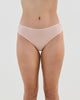 Model wears Cotton And Lace Bikini in LATTE. On body front view