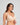 Model wears Comfit Collection Wire Free Bra in LATTE. On body side view
