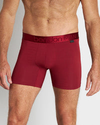 Model wears Bamboo Mens Trunk in BIKING RED. On body front view