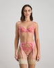 Model wears Josephine Suspender in SACHET PINK. On body front view