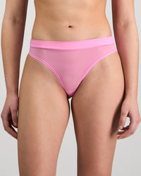 Model wears Lightweight High Cut Brief in BUBBLEGUM PINK. On body front view