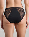 Model wears Aria High Cut Brief in BLACK. On body back view