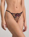 Model wears Niara Thong in BLACK/BEAUJOLAIS. On body side view