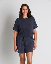 Model wears Sleep-Talk Short Sleeve Top in NIGHT SKY. On body front view
