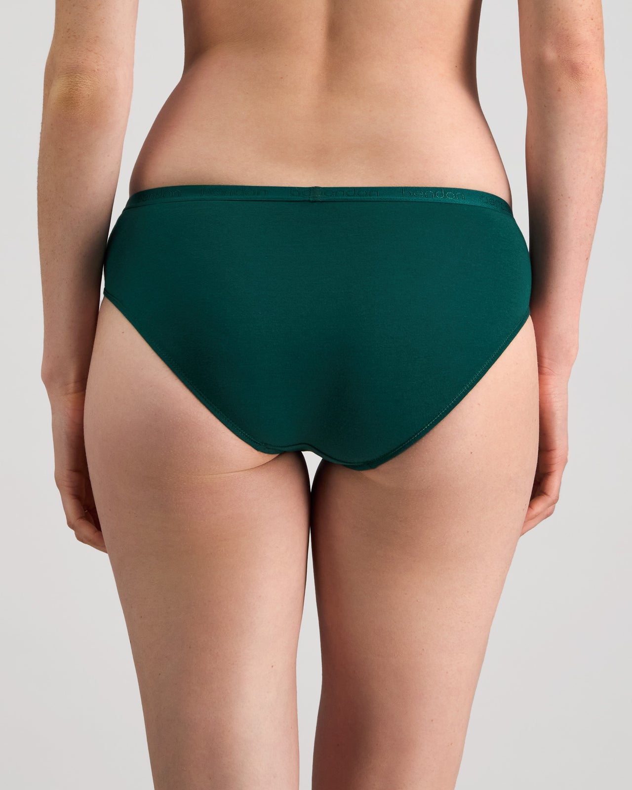 Model wears Body Cotton Bikini in RAIN FOREST. On body back view