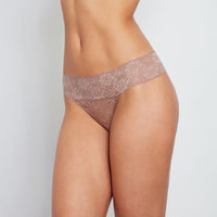 Model wears Lace Thong in MOCHA. On body front view
