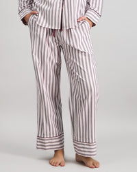 Model wears Cosy Flannel Long Pj Pant in PINK-A-BOO. On body front view