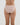 Model wears Lacey Bikini in LATTE. On body back view