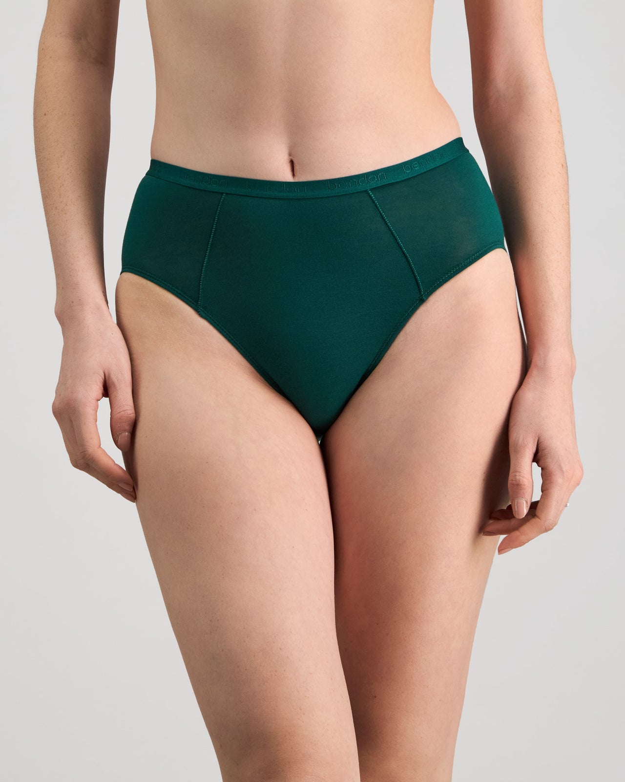 Model wears Body Cotton High Cut Brief in RAIN FOREST. On body front view