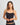 Model wears Simply Seamless Camisole in BLACK. On body front view