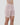 Model wears Smoothing Bodywear Chafer Short in CARAMEL. On body side view