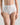 Model wears Freestyle Full Brief in WHITE. On body front view