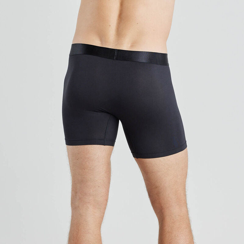 Model wears Bamboo Mens Trunk in BLACK. On body back view