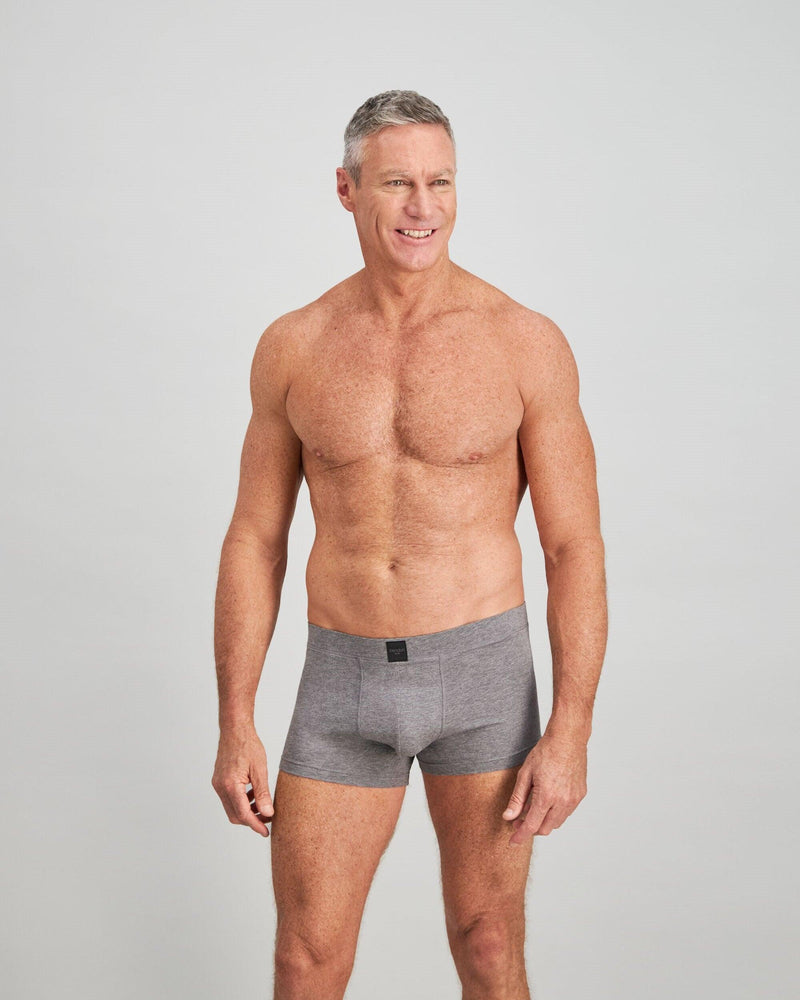 Model wears High Tech Cotton Mens Trunk in GREY MARL. On body front view