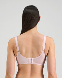 Model wears Classic Underwire Underwire Bra in PALE LILAC. On body back view