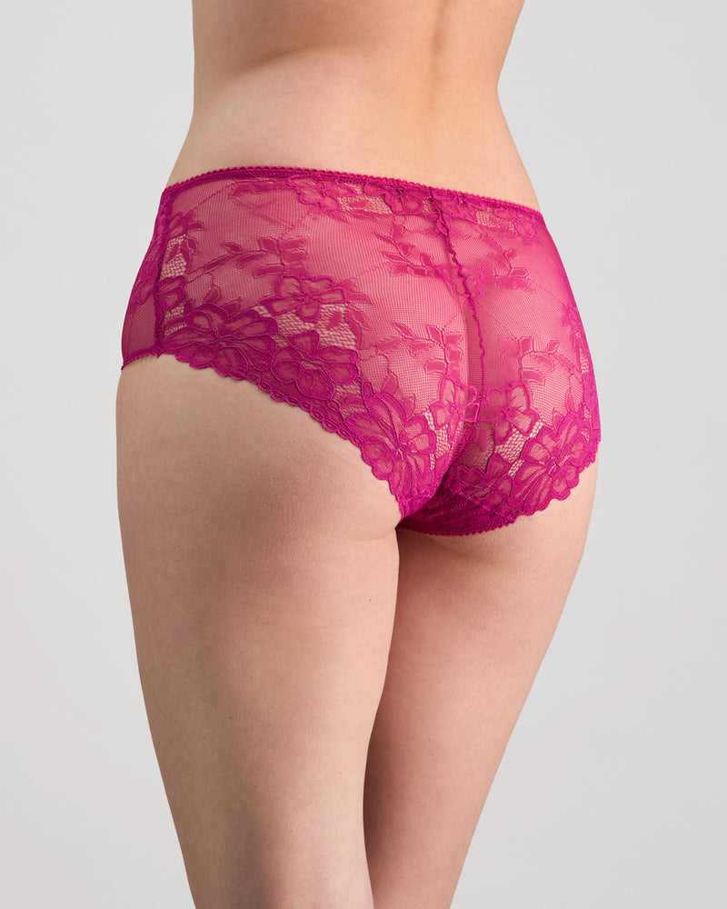 Model wears All Lacey Full Brief in FANTASY FUCHSIA. On body back view