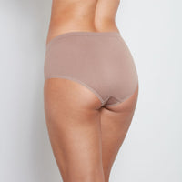Model wears Seamless Full Brief in MOCHA. On body back view