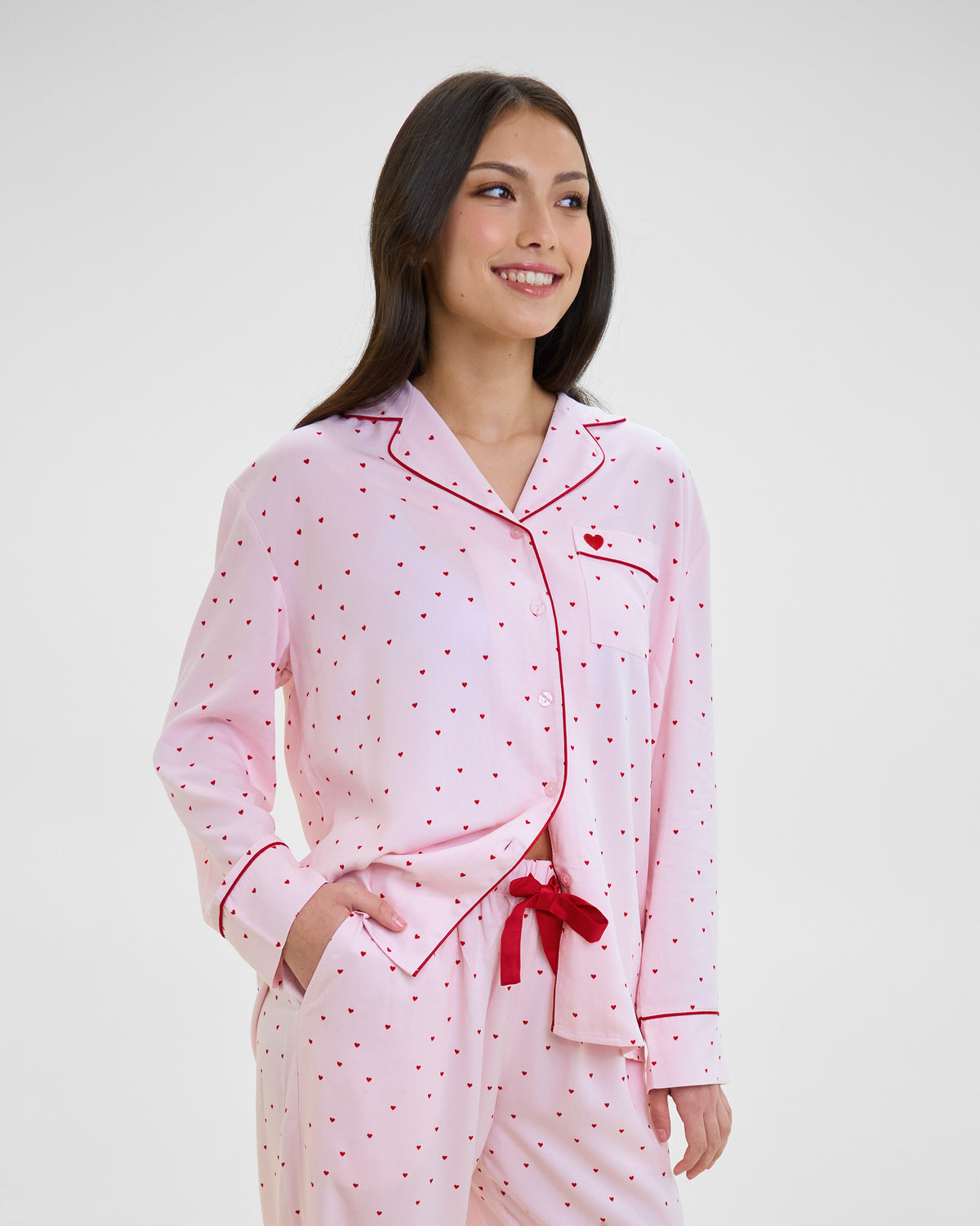 Model wears Hearts In Cabana Long Sleeve Pj Top in MINI HEART PRINT. On body side view