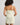 Model wears Smoothie Chemise in TRANSPARENT YELLOW. On body back view