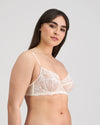 Model wears Sofia Underwire Bra in CAMEO. On body side view